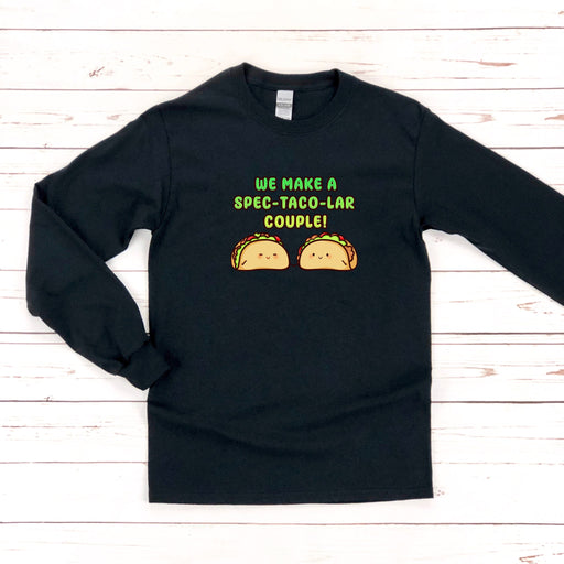 a black sweatshirt with two tacos on it