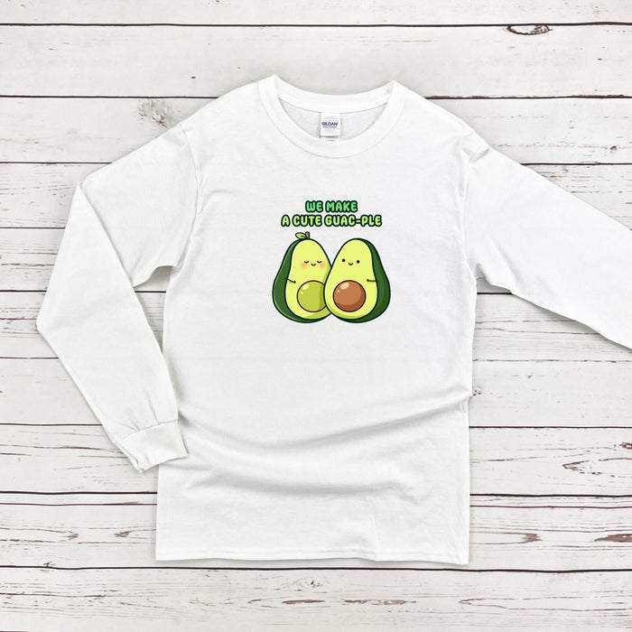 a white long sleeve shirt with an avocado on it