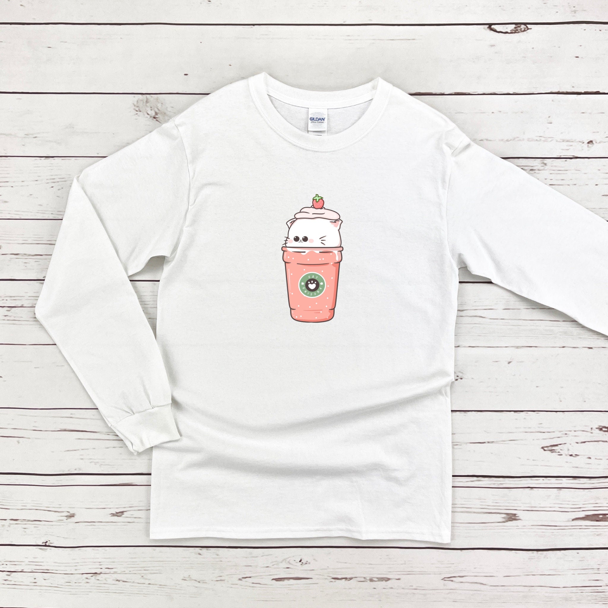 a white shirt with a cup of coffee on it