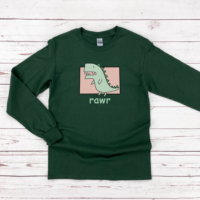 a green long sleeve shirt with a dinosaur on it