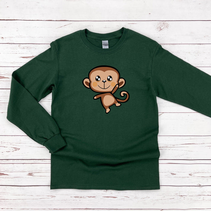 a green shirt with a cartoon monkey on it