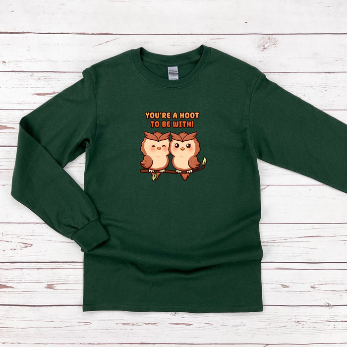 a green long sleeve shirt with two owls saying you&#39;re a hoot to