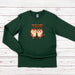 a green long sleeve shirt with two owls saying you&#39;re a hoot to