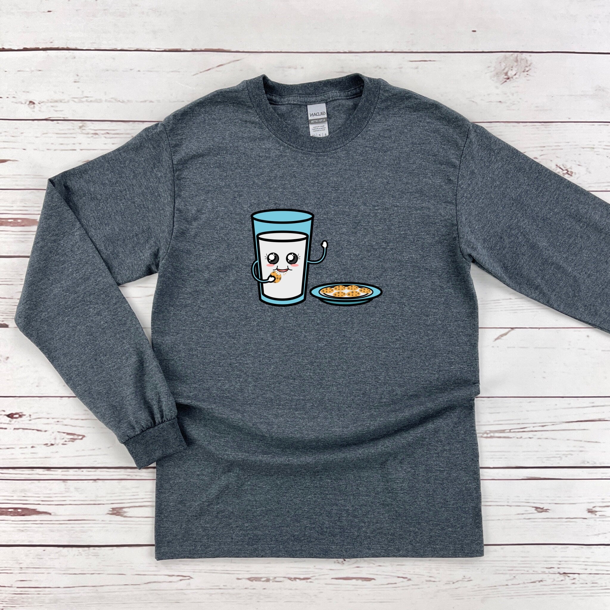 a gray shirt with a cup of coffee and a plate of food