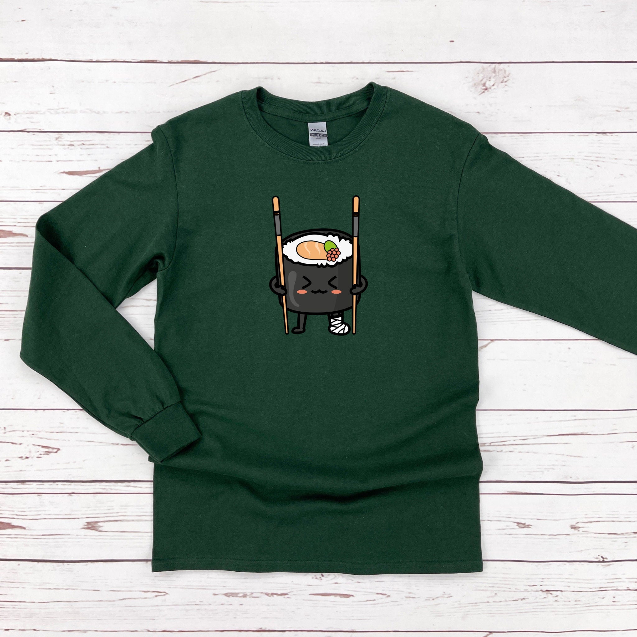 a green shirt with a sushi on it
