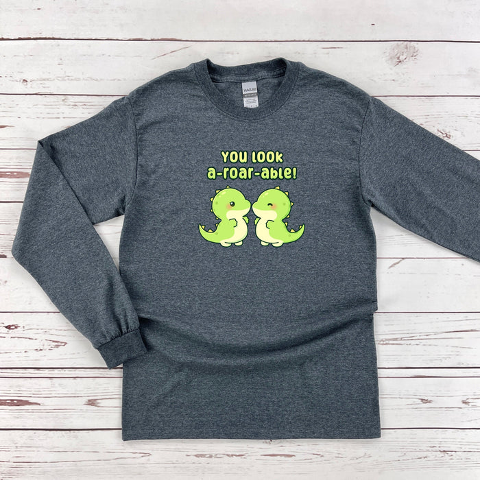 a long sleeved shirt with the words you look a total abiel on it