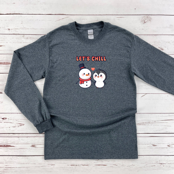 a long sleeved shirt with a penguin and penguin on it