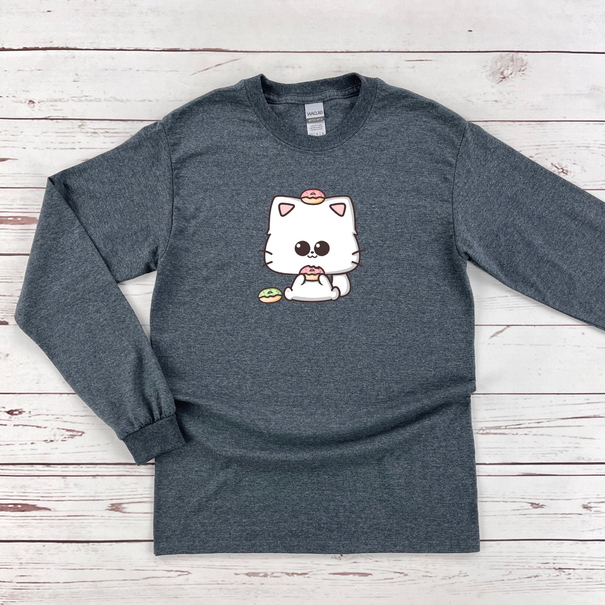 a gray shirt with a white cat on it