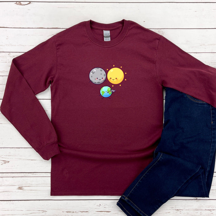 a t - shirt with a picture of the planets on it