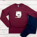 a red shirt with a white cat on it