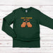 a green t - shirt with two brown bears saying capsy - tirated by