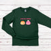 a green long sleeve shirt that says i love you, puddinging