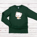 a green shirt with a cat on it