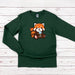 a green shirt with a red panda bear on it