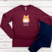 a red shirt with a cartoon cat on it