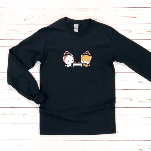 a black sweatshirt with two cats and a dog on it