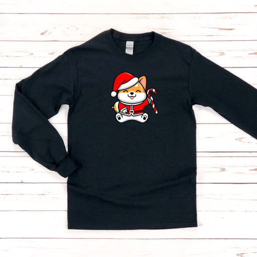 a black shirt with a cat wearing a santa hat and holding a candy cane