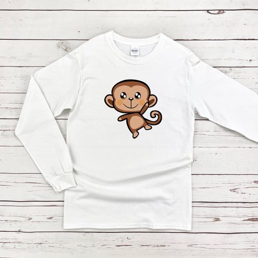 a white shirt with a cartoon monkey on it