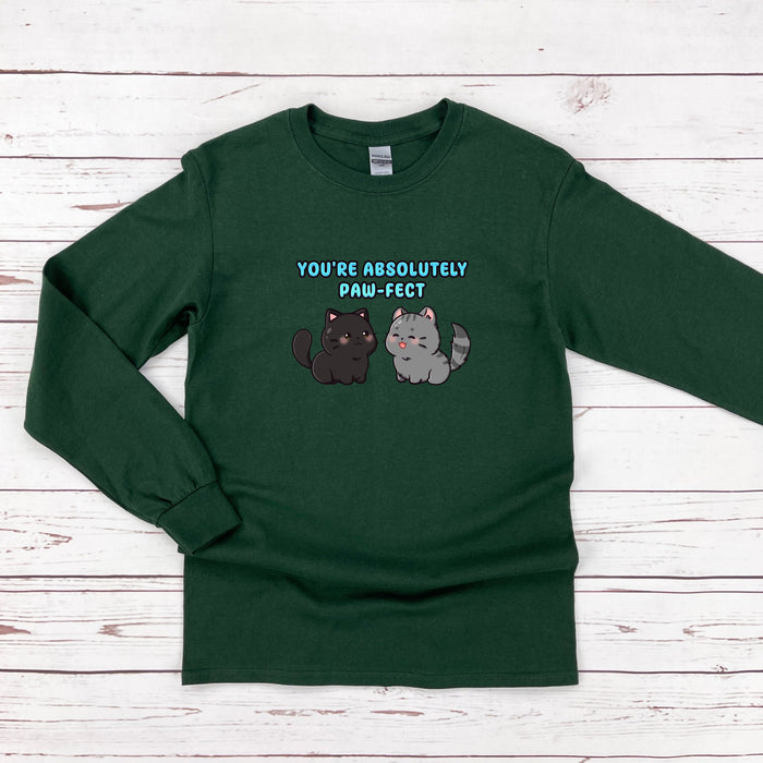 a green shirt with two cats on it