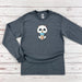 a long sleeved shirt with a panda eating a cup of coffee