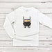 a white shirt with a sushi on it