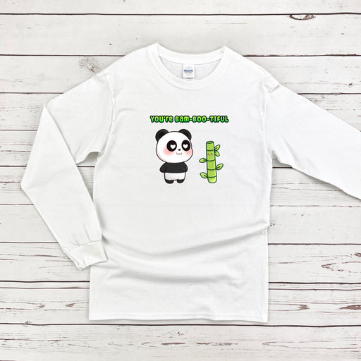 a white long sleeve shirt with a panda holding a cactus