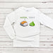 a white long sleeve shirt with sushi on it