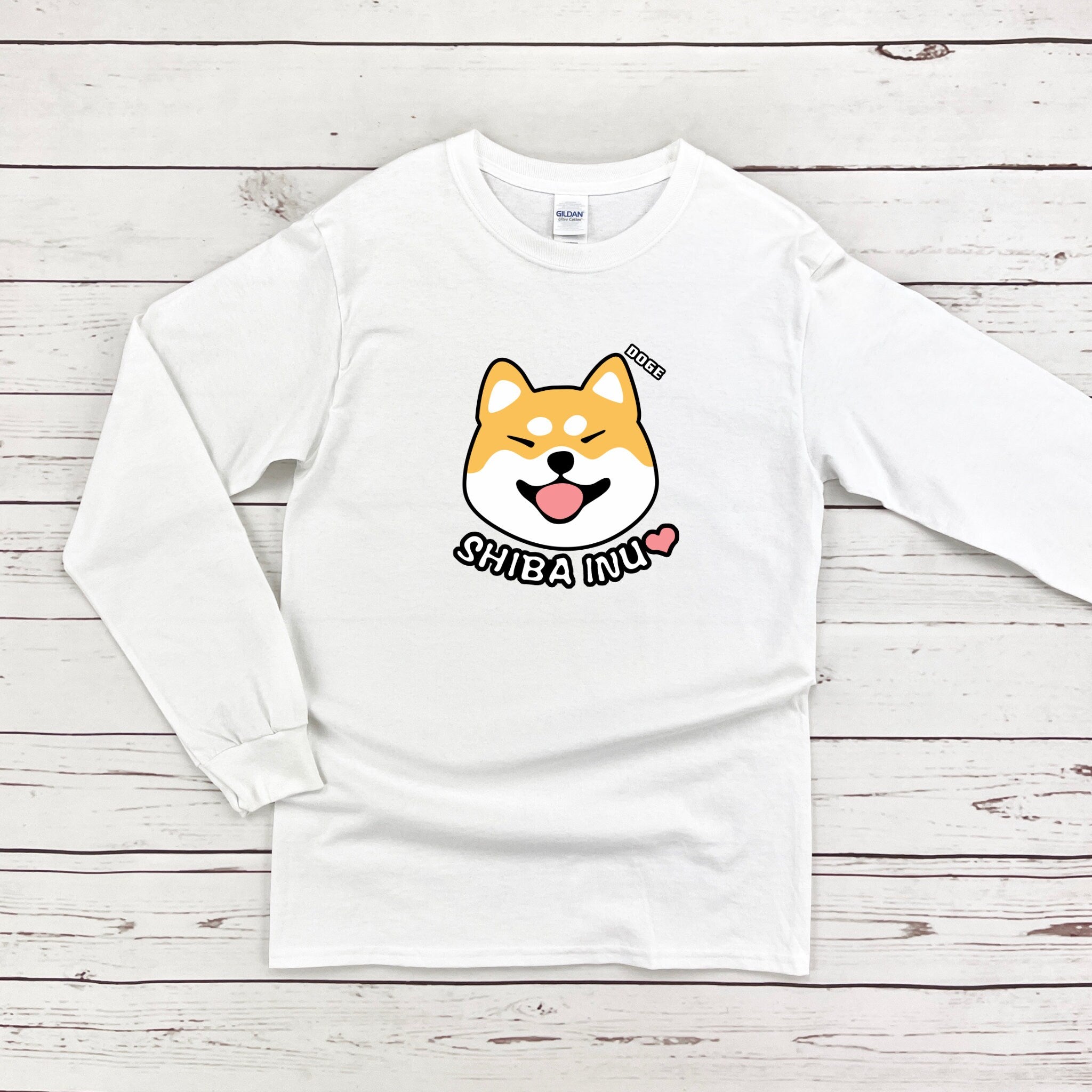 a white shirt with a dog on it