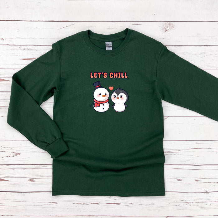 a green long sleeved shirt with two snowmen on it