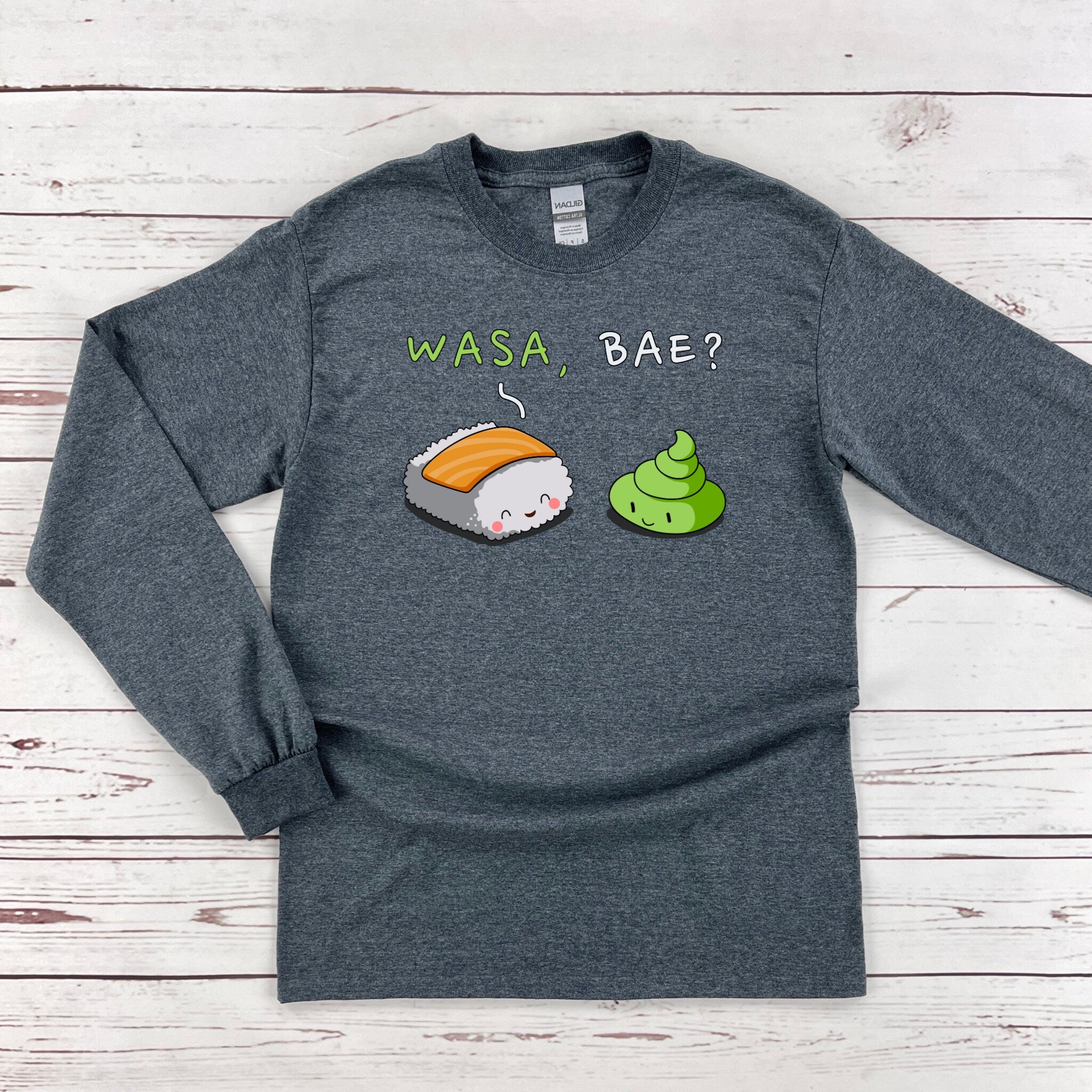 a long sleeved shirt with sushi on it