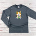 a gray long sleeve shirt with a cartoon cat on it
