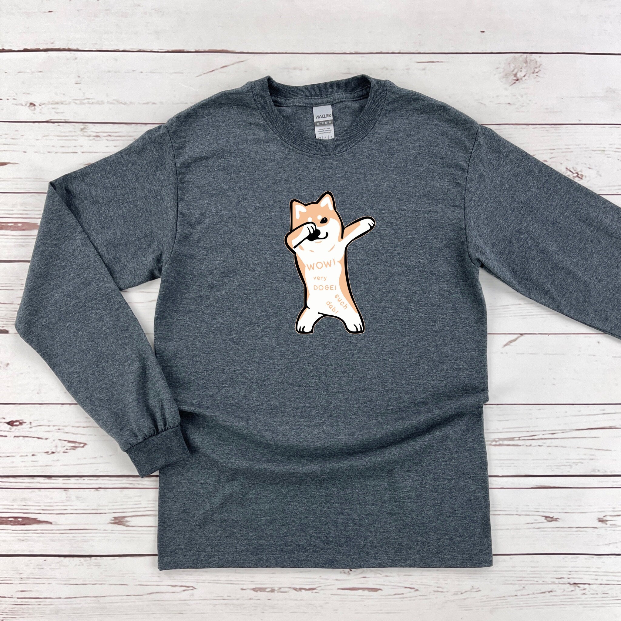 a gray shirt with a dog on it