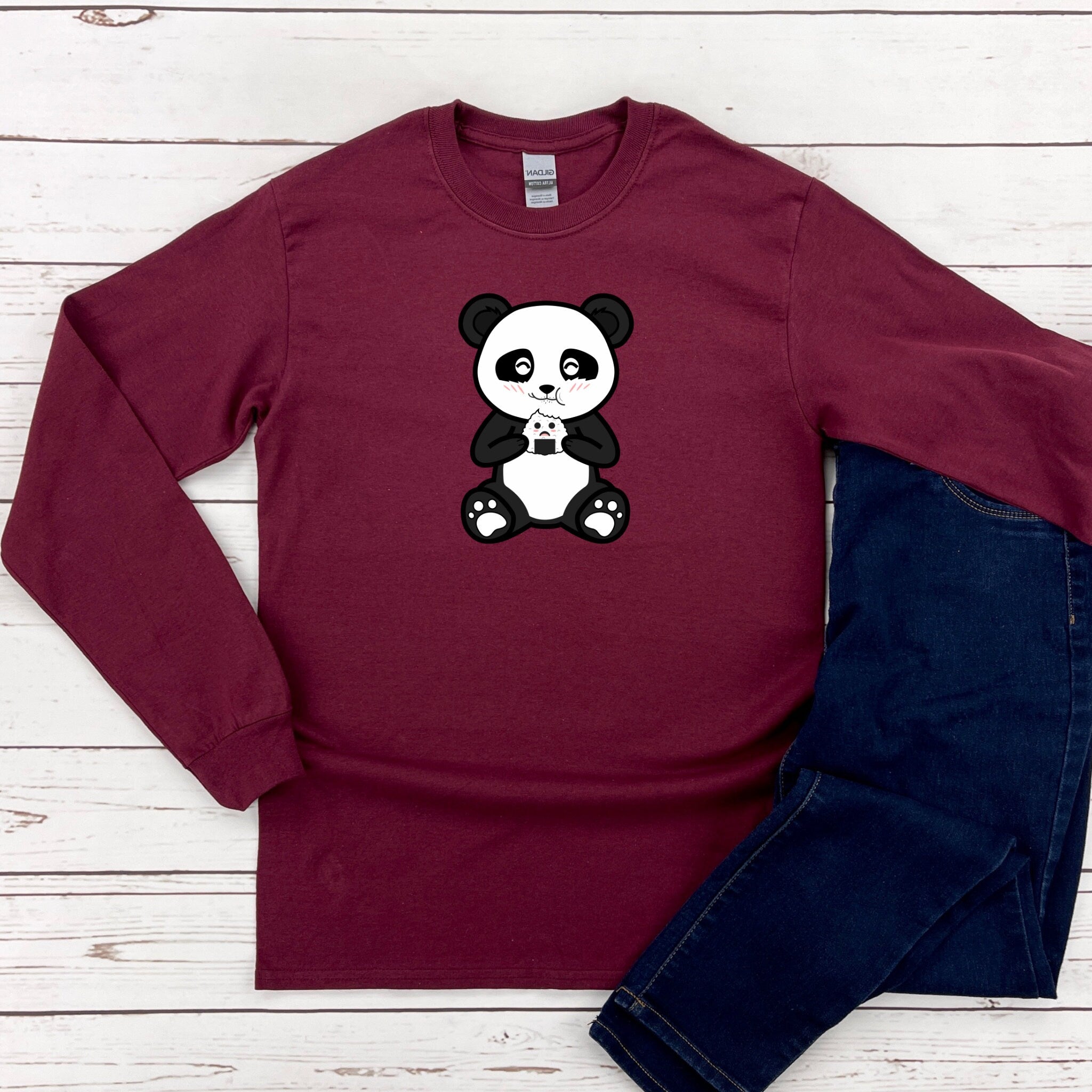a red shirt with a panda bear on it
