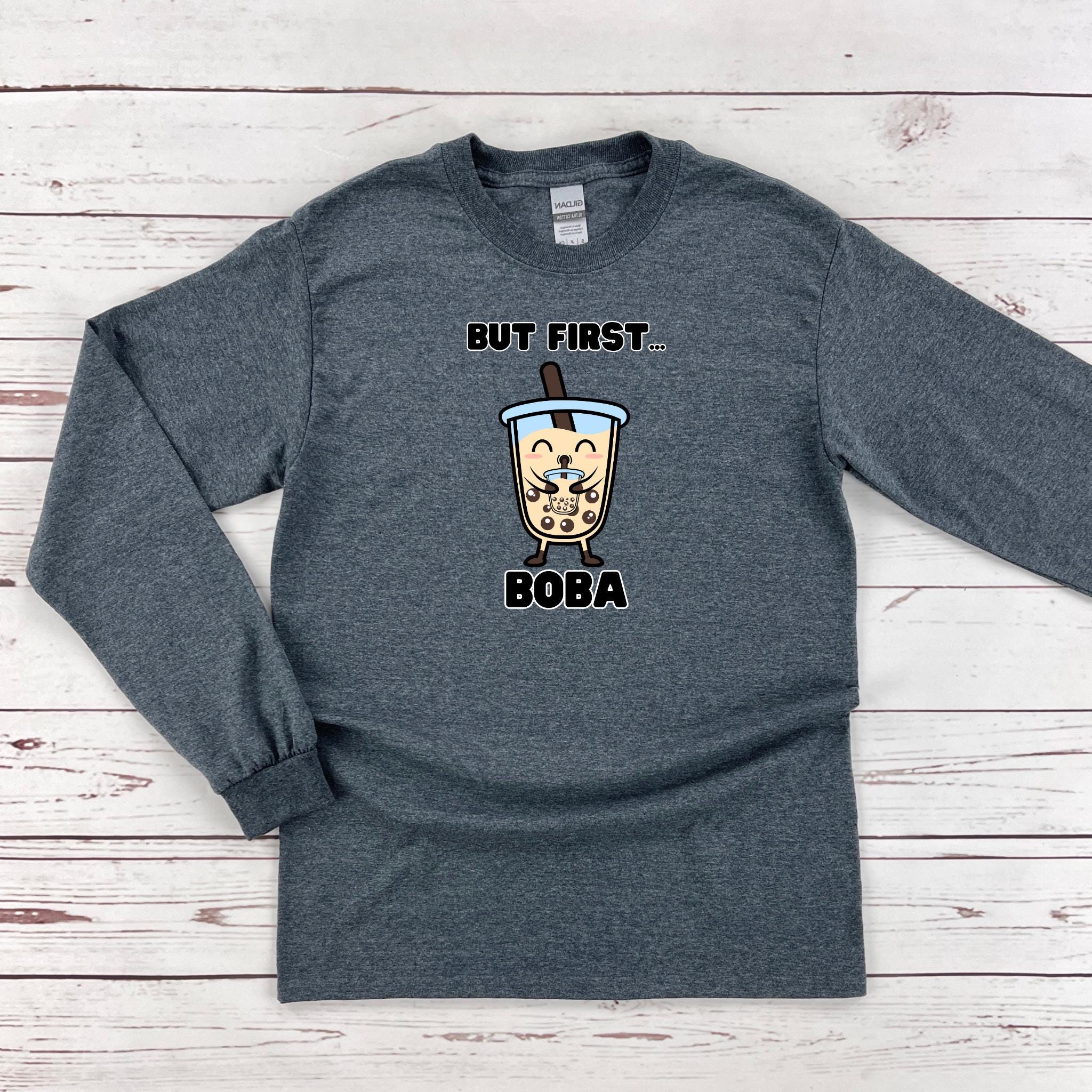a gray shirt that says but first boba on it