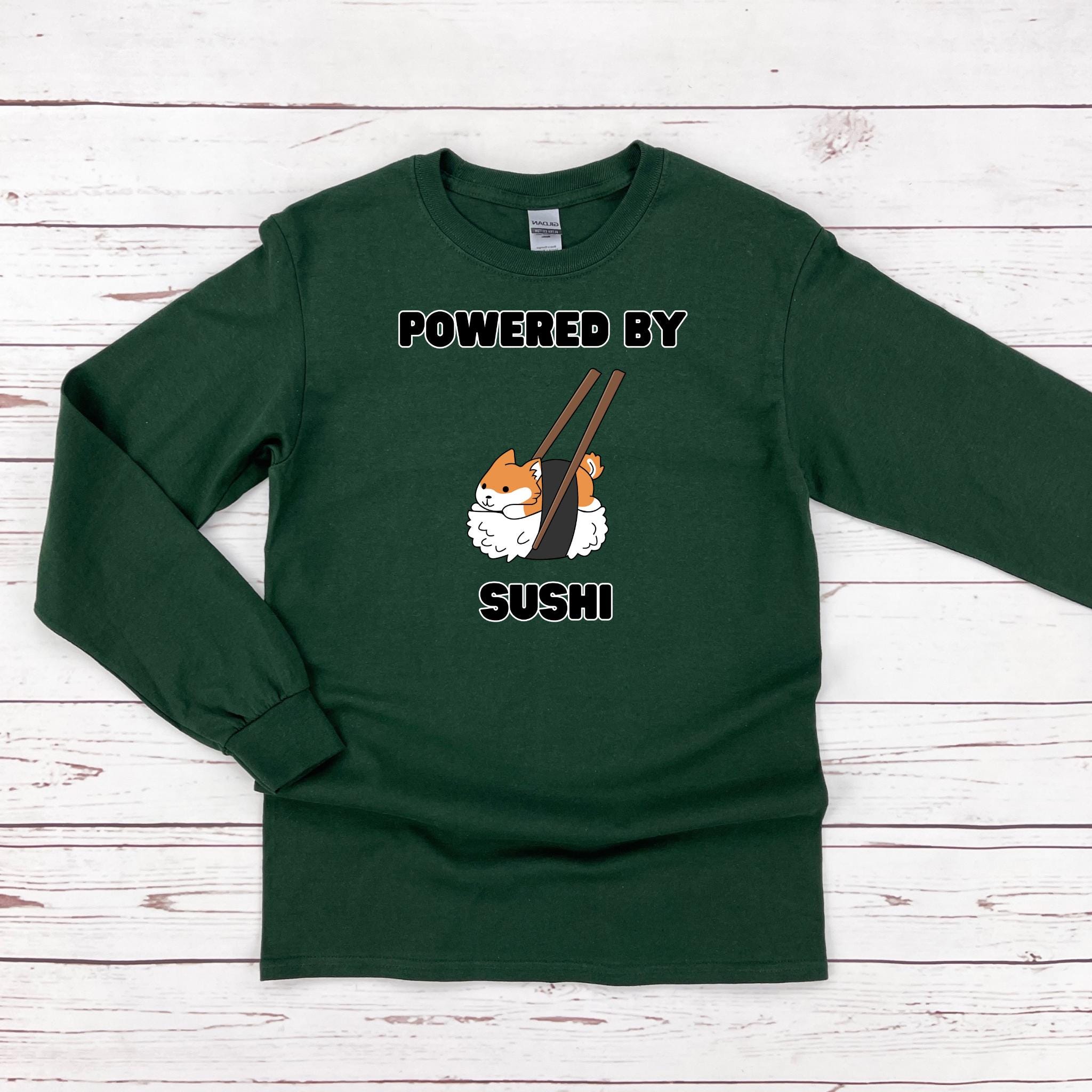 a green shirt with a picture of a hamster on it that says powered by