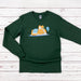 a green shirt with a dog laying on top of it