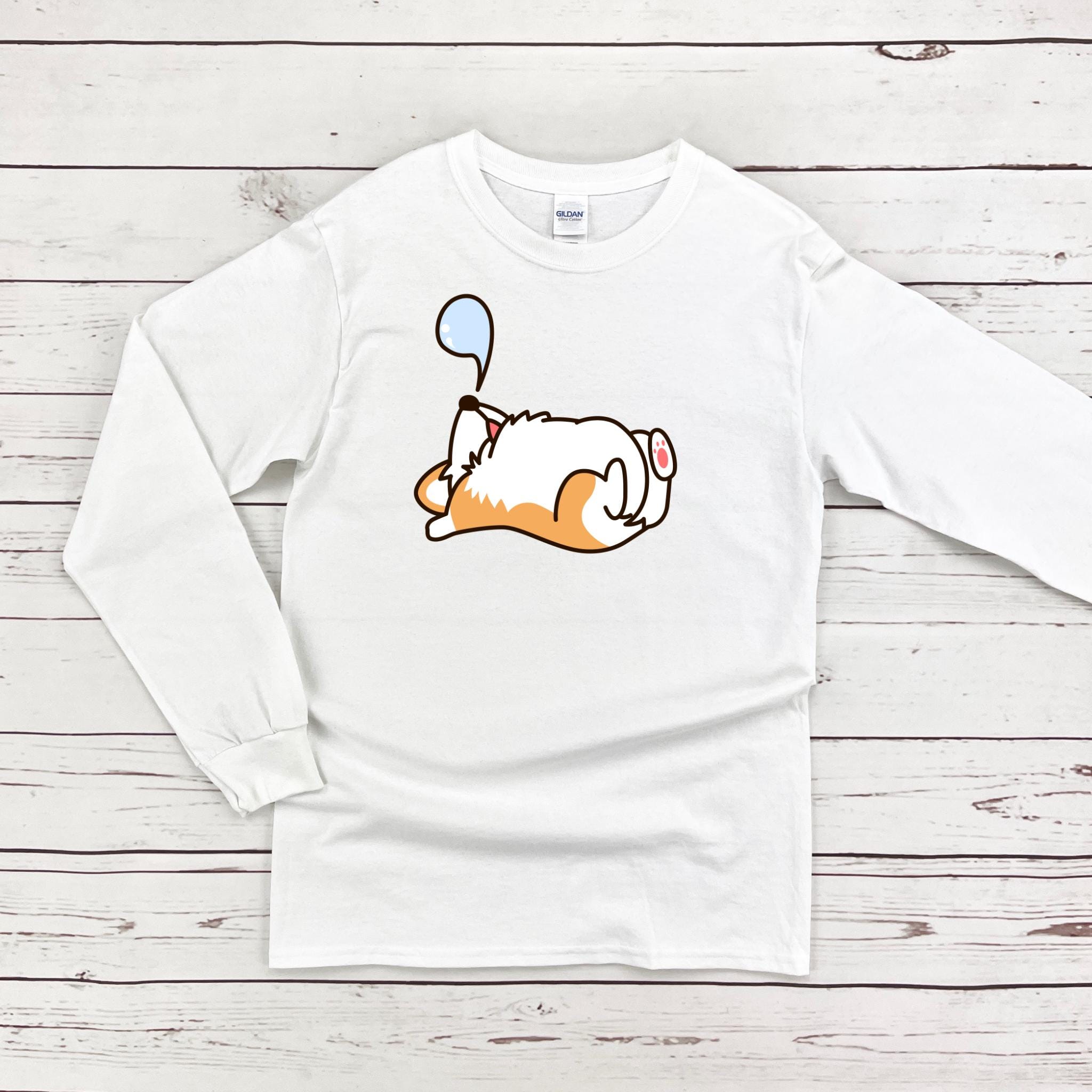 a white shirt with an orange and white dog on it