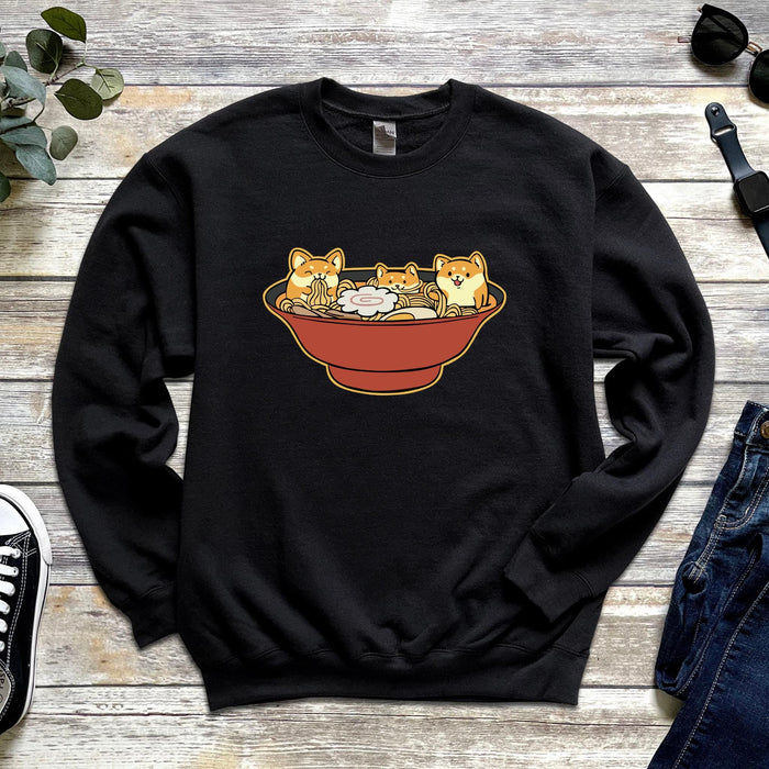 a black sweater with a picture of two cats in a bowl