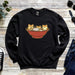 a black sweater with a picture of two cats in a bowl