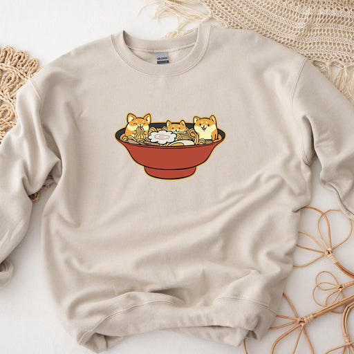a sweatshirt with a picture of three cats in a bowl