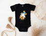 a black bodysuit with a picture of a cartoon character on it