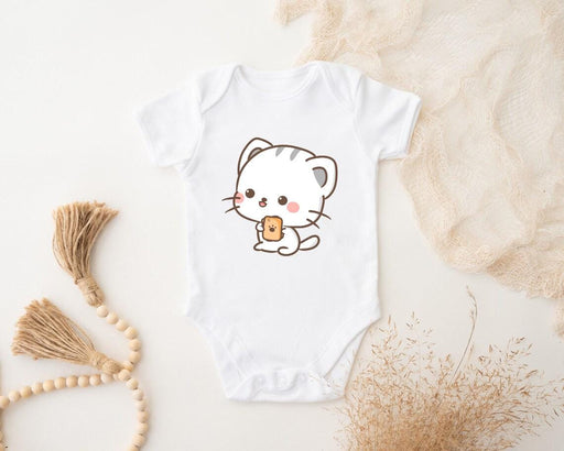 a white bodysuit with a cartoon cat holding a cup of coffee