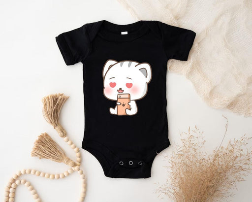 a baby bodysuit with a picture of a cat on it
