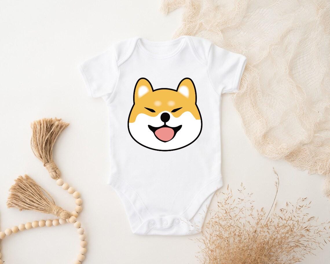 a baby bodysuit with a dog's face on it
