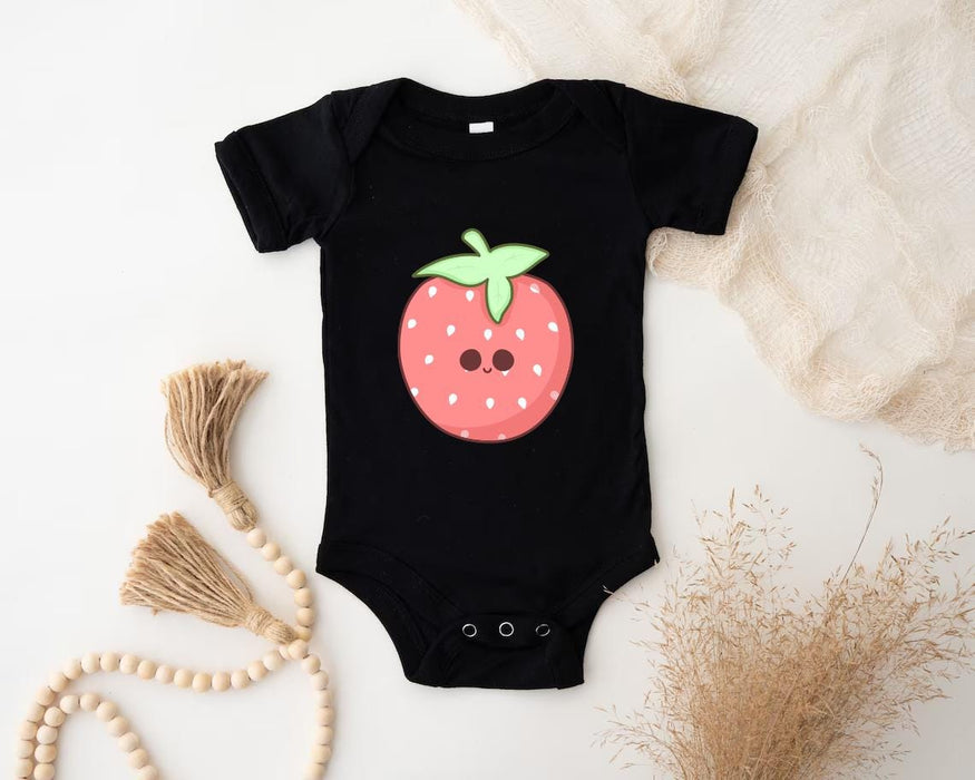 a black bodysuit with a strawberry on it