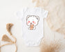 a baby bodysuit with a bear holding a cup of coffee