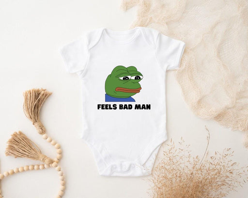a baby bodysuit with the words feels bad man printed on it