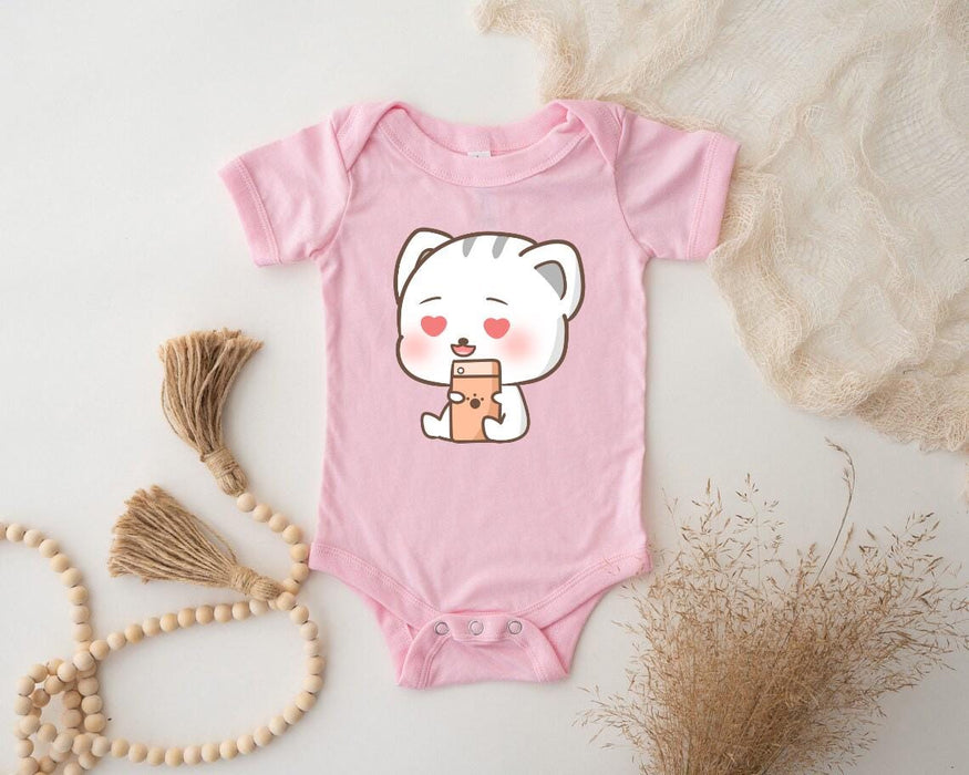 a baby bodysuit with a picture of a cat on it