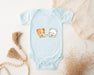 a baby bodysuit with a picture of a cat and a dog on it