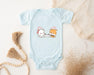 a baby bodysuit with a picture of a cat and a dog on it